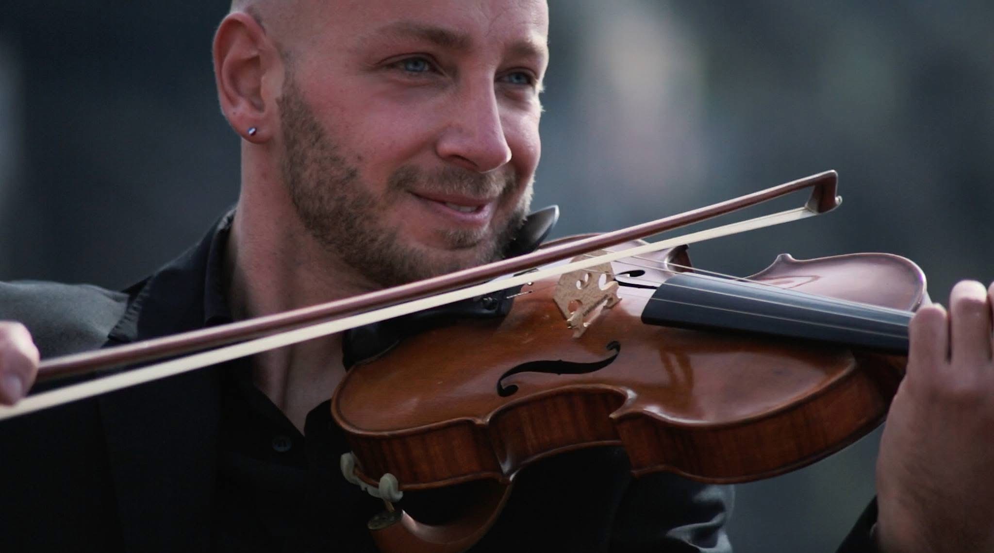 Donato Cipriano performing violin solo on the Amalfi Coast